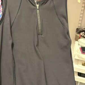 Black sweat proof Athleta sleeveless dress. Runs SMALL. Nice fit a fun function.